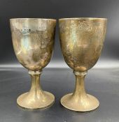 Two silver cups by Harris Brothers, hallmarked for 1897 and 1900, engraved to base (Approximate