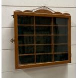 A wall hanging display case