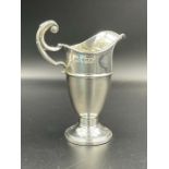 A hallmarked silver milk jug by Deykin & Harrison, Birmingham 1934 (Approximate Total weight 74g)