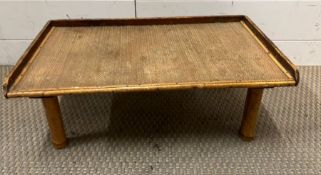 A 1960's bamboo and woven tray table (H20cm W54cm D30cm)