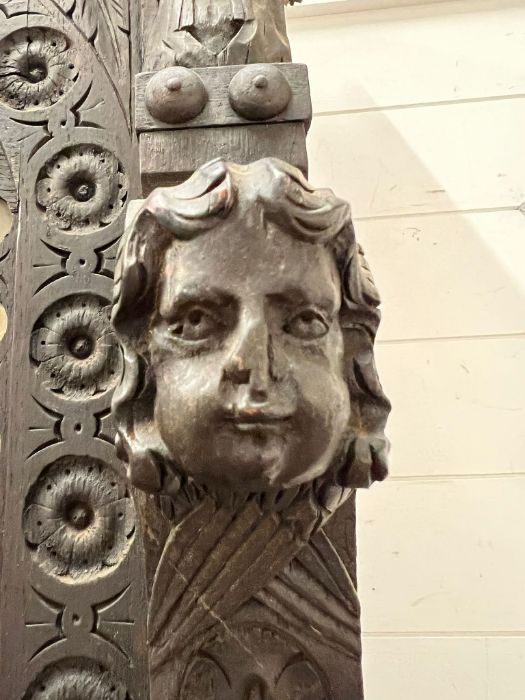 A Gothic inspired glazed bookcase cabinet with carved lion heads to each corner with brass rings and - Image 3 of 10