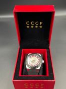 CCCP Soyus-Apollo automatic maroon dial watch with black bezel ss case, black silicon strap.