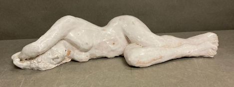 A studio ceramic of a recumbent nude (W52cm)