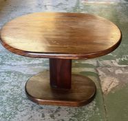 An oval side table, weighted bottom (H46cm W65cm D48cm)