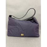 A Moschino nylon and leather shoulder bag with dust cover (W30cm)