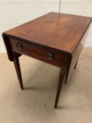 A Pembroke table with tapering legs and drawer to centre (H69cm W73cm D49cm)