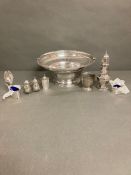 A volume of silver plate to include cruet set, sugar shaker, cup and substantial handled basket.
