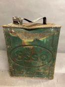 A vintage metal petrol can by Esso