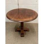 A mahogany pedestal table on square legs (H44cm Dia44cm)