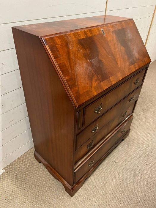 A mahogany bureau with fitted interior of pigeon holes and small drawers on bracket feet (H100cm - Image 3 of 5