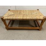 A woven stool on pine frame (H28cm W64cm D35cm)