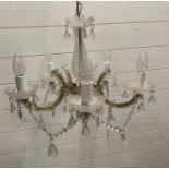 A six arm cut glass chandelier