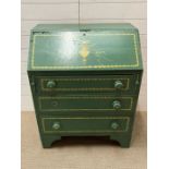 A painted bureau with fall front opening to pigeon holes and drawers