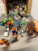A selection of McDonalds happy meal toys including Toy Story and ET
