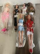 Six Barbie and Spice Girl dolls