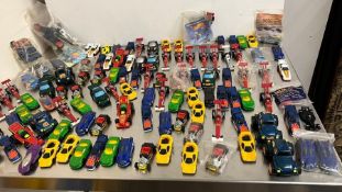 A large selection of Hot Wheel cars, including Diecast models