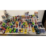 A large selection of Hot Wheel cars, including Diecast models