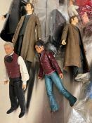 A selection of dolls and figures including Harry Potter and Joe 90