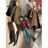 A selection of dolls and figures including Harry Potter and Joe 90