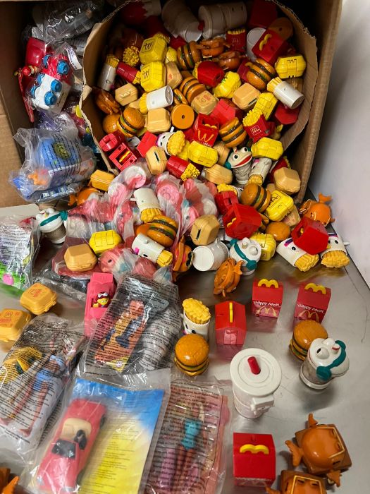 A selection of McDonalds and Burger King toys