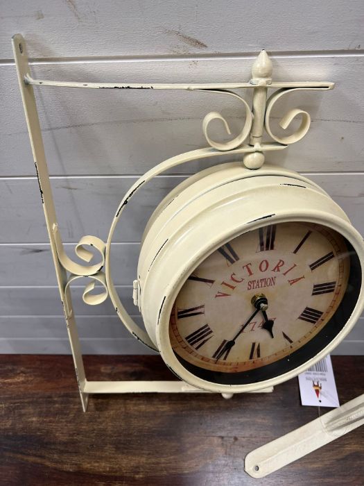 A reproduction wall clock with wall hanging - Image 2 of 2