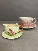 A Carlton ware jug along with a Mygott "The Hunter" tea cup and saucer