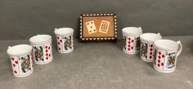A card set and a bridge card set and six playing car mugs