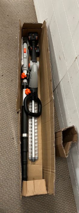 A garden pole trimmer in box by Von Waus