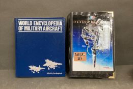 An encyclopedia of Military aircrafts and a Duxford airshow photo album