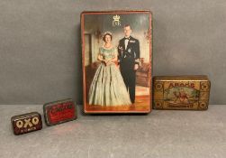 A selection of four vintage tins
