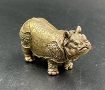 A brass vesta in the form of a rhinoceros
