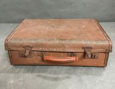 A small brown vintage case