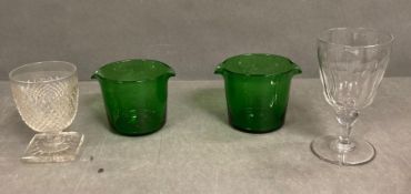 A pair of green wine glass coolers and two rummers