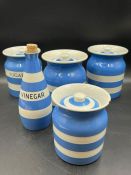 A selection of five pieces of blue and white Cornishware to include a vinegar bottle
