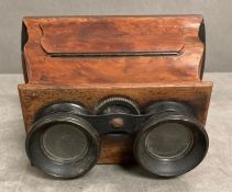 A vintage walnut stereo scope