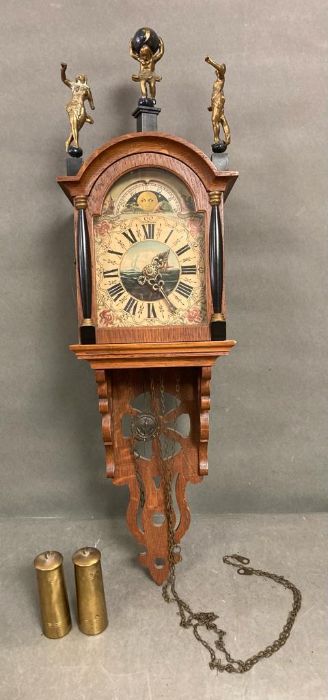 A wall hanging clock