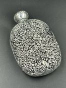 A floral decorated scent bottle, marked 835