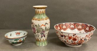 Three Chinese china items to include a vase and two bowls