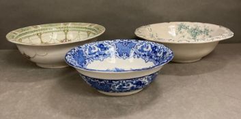 Three large ceramic bowls