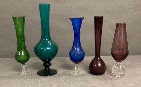 A selection of five coloured glass vases