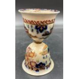 A porcelain wager cup