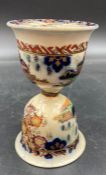 A porcelain wager cup