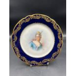 An 18th Century Sèvres hand-painted and parcel-gilt cobalt porcelain portrait plate of the Duchess