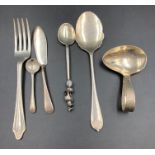 A small selection of silver cutlery to include baby spoon, jam spoon etc, various makers and