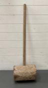 A vintage wooden fairground mallet