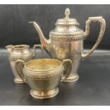 A three piece white metal tea service, awarded in 1924 to Band Sergeant GAP Wilson of the 1st