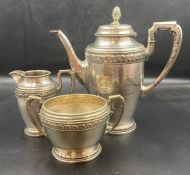 A three piece white metal tea service, awarded in 1924 to Band Sergeant GAP Wilson of the 1st