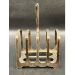 A silver toast rack by James Dixon & Sons Ltd, hallmarked for Sheffield 1901 (Approximate Total
