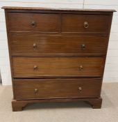 Two over three chest of drawers with bracket feet and ring handles (H115cm W106cm D52cm)