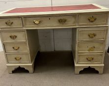 A Painted pedestal desk in white with leather top (100cm x 60cm x 78cm)